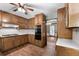 Well-appointed kitchen with wood cabinets, stainless steel appliances, and ample counter space at 41 Ridgewood Cir, Mcdonough, GA 30252