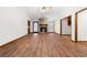 Spacious living room featuring a cozy stone fireplace and gleaming hardwood floors for comfortable living at 41 Ridgewood Cir, Mcdonough, GA 30252