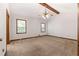 The spacious primary bedroom features new carpet, a ceiling fan, and windows for natural light at 41 Ridgewood Cir, Mcdonough, GA 30252