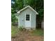 Outdoor storage building with wood siding and a classic design at 41 Ridgewood Cir, Mcdonough, GA 30252