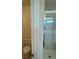 Bathroom featuring a toilet and a glass-enclosed shower at 136 Paulownia Cir, Mcdonough, GA 30253