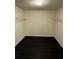 Walk-in closet with dark wood flooring at 136 Paulownia Cir, Mcdonough, GA 30253