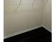 Well-organized closet with shelving units and dark wood flooring at 136 Paulownia Cir, Mcdonough, GA 30253