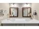 Bathroom featuring double vanity and framed mirrors at 4311 Parkside Pl, Atlanta, GA 30342