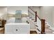 Elegant entryway with staircase, stylish console table, and decorative lighting at 4311 Parkside Pl, Atlanta, GA 30342