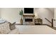 Bright living room featuring modern fireplace with brick surround, plush seating, and neutral decor at 4311 Parkside Pl, Atlanta, GA 30342