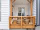 Inviting covered patio with wooden railings and outdoor seating at 4311 Parkside Pl, Atlanta, GA 30342