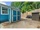 Partially fenced backyard with storage shed and patio at 1718 Cahoon Sw St, Atlanta, GA 30310
