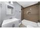 Updated bathroom featuring a single sink vanity, neutral wall colors, and a tile shower at 1718 Cahoon Sw St, Atlanta, GA 30310