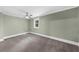 Bedroom featuring neutral walls, carpet, and a ceiling fan at 1718 Cahoon Sw St, Atlanta, GA 30310
