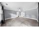 Large bedroom featuring neutral walls, carpet, and access to bathroom at 1718 Cahoon Sw St, Atlanta, GA 30310