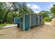 Long driveway leading to the home and sheds, providing ample parking space at 1718 Cahoon Sw St, Atlanta, GA 30310