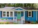 Close up view of the front porch showcasing fresh paint and new hardware at 1718 Cahoon Sw St, Atlanta, GA 30310