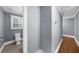 Hallway with access to bathroom with tile flooring at 1718 Cahoon Sw St, Atlanta, GA 30310