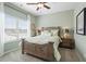 Cozy bedroom with a large window, natural lighting, and country-style decor at 48 Calla Dr, Douglasville, GA 30134