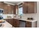 Updated kitchen with white countertops, sleek stainless steel appliances, and stylish backsplash at 48 Calla Dr, Douglasville, GA 30134