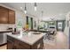 Open concept kitchen provides seamless flow into the dining and living areas, great for everyday living at 48 Calla Dr, Douglasville, GA 30134