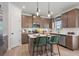 Beautiful kitchen with stainless steel appliances, kitchen island, and sleek white backsplash at 48 Calla Dr, Douglasville, GA 30134