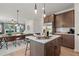 Open concept kitchen flows into the dining and living areas, perfect for entertaining and Gathering gatherings at 48 Calla Dr, Douglasville, GA 30134