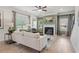 Cozy living room featuring a fireplace, hardwood floors, and neutral decor for a warm and inviting atmosphere at 48 Calla Dr, Douglasville, GA 30134