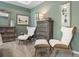 Main bedroom showcases stylish furniture, creating a comfortable seating area at 48 Calla Dr, Douglasville, GA 30134