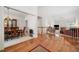 Inviting foyer showcasing hardwood floors, with views of the dining and living areas in an open layout at 207 Breckenridge Ct, Canton, GA 30115