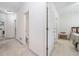 Hallway with access to laundry, bathroom, and bedroom; great for navigation and accessibility at 207 Breckenridge Ct, Canton, GA 30115