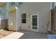 Rear of house featuring a back porch and backyard with privacy fence at 3016 Creekside Overlook Way, Austell, GA 30168