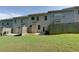 Backyard view of the property with a privacy fence at 3016 Creekside Overlook Way, Austell, GA 30168