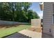The house features a grassy backyard with privacy fence at 3016 Creekside Overlook Way, Austell, GA 30168