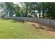 The backyard features a long privacy fence at 3016 Creekside Overlook Way, Austell, GA 30168
