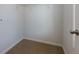 This closet has carpeted floors, white walls, and wire racks for storage at 3016 Creekside Overlook Way, Austell, GA 30168
