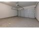 Spacious garage with epoxy flooring and an automatic door at 3016 Creekside Overlook Way, Austell, GA 30168