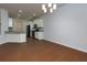 Kitchen features granite countertops, white cabinets, and stainless steel appliances at 3016 Creekside Overlook Way, Austell, GA 30168