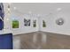 Large bonus room with hardwood floors and ample natural light through windows at 2497 Wawona Dr, Brookhaven, GA 30319