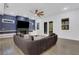 Spacious living room features a fireplace, television, and large sectional at 2497 Wawona Dr, Brookhaven, GA 30319