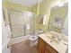 Cozy bathroom featuring a shower-tub combo, and a wood vanity at 2251 Stag Run Run, Suwanee, GA 30024