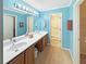 Bright bathroom with double sinks, vanity, and a separate shower at 2251 Stag Run Run, Suwanee, GA 30024