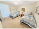 Comfortable bedroom with twin beds, soft lighting, and neutral decor at 2251 Stag Run Run, Suwanee, GA 30024