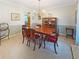 Classic dining room with wooden furniture, display cabinet, and elegant decor at 2251 Stag Run Run, Suwanee, GA 30024