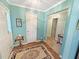Welcoming entryway with a decorative rug and access to other rooms at 2251 Stag Run Run, Suwanee, GA 30024