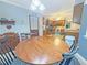 Cozy kitchen nook featuring a wood table and chairs with views of the backyard at 2251 Stag Run Run, Suwanee, GA 30024