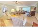 Bright living room with comfortable seating, a fireplace, and a view of the backyard at 2251 Stag Run Run, Suwanee, GA 30024