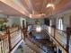 This foyer features high ceilings, grand staircase, wood and white railings, and chandelier at 5523 Bahia Mar Cir, Stone Mountain, GA 30087