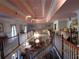 Expansive foyer features soaring ceilings, grand staircase, decorative chandeliers, and gallery landing at 5523 Bahia Mar Cir, Stone Mountain, GA 30087