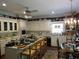 Bright kitchen with an island, white cabinets, modern appliances, and a sunny breakfast area at 5523 Bahia Mar Cir, Stone Mountain, GA 30087