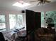 Bright living room with a skylight, large windows, and views of the outdoors at 5523 Bahia Mar Cir, Stone Mountain, GA 30087
