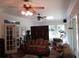 Bright living room features multiple ceiling fans, skylight and several windows allowing for lots of natural light at 5523 Bahia Mar Cir, Stone Mountain, GA 30087