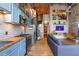Spacious living area boasts exposed brick walls, modern decor, spiral staircase, and an open layout at 10 James St # 11B, Hampton, GA 30228
