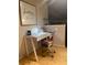 Office nook featuring a compact desk, unique chair and stylish decor at 10 James St # 11B, Hampton, GA 30228